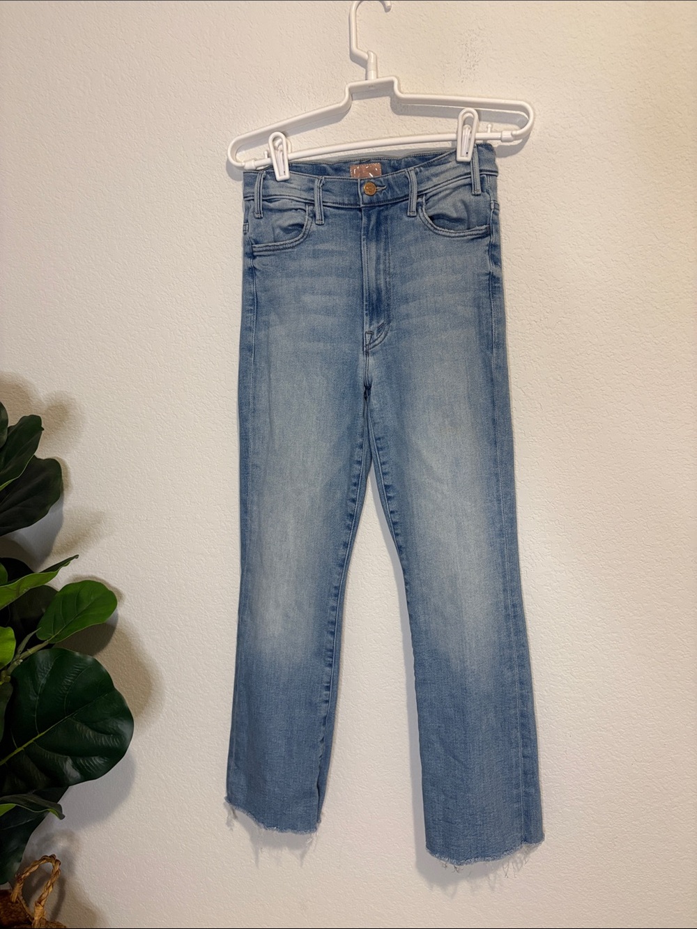 MOTHER Denim's "The Hustler Ankle Fray" in the "Au Revoir” 26 light blue wash